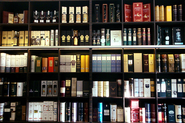 bottles arranged on shelf